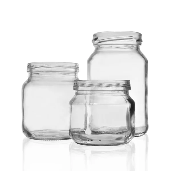 Tres frascos de vidrio vacíos — Foto de Stock