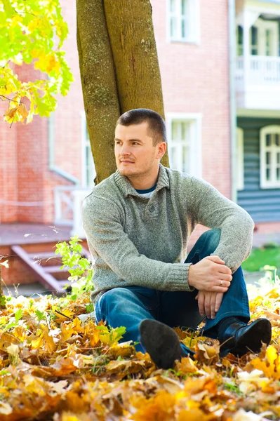 stock image Portrait of man sitting on ground