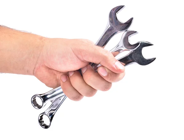 A mão com a chave inglesa — Fotografia de Stock