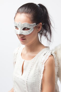 Angel in a white mask