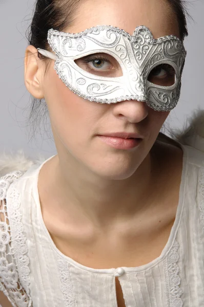Angel in a white mask — Stock Photo, Image