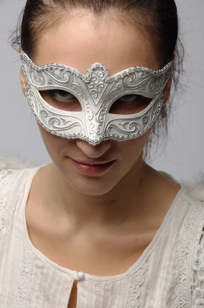 Angel in a white mask — Stockfoto
