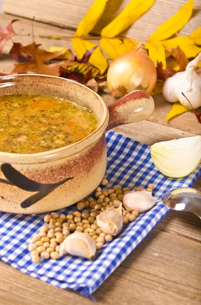 stock image Pea soup (Polish Grochowka) with smoked meat chicken breast