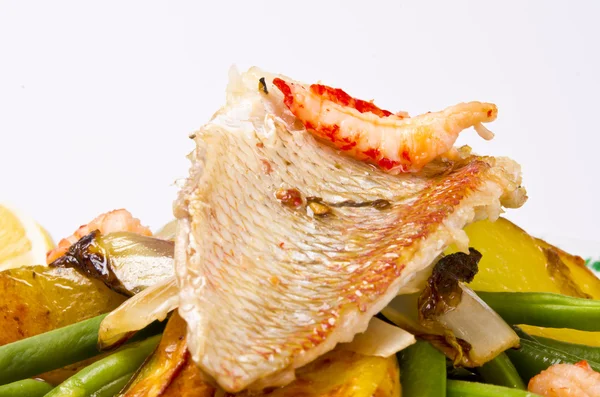 Roasted Dorade with seafood and French beans — Stock Photo, Image