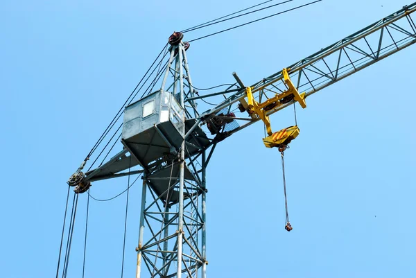 Tower crane with a cabin — Stock Photo, Image