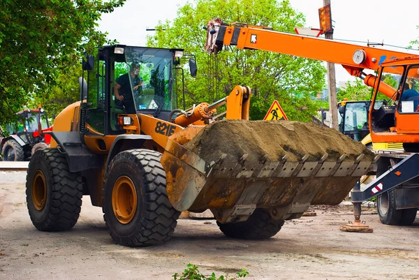 Excavator for road works — Stock Photo, Image