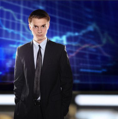 Stock Exchange Businessman in a suit against a stock quote clipart