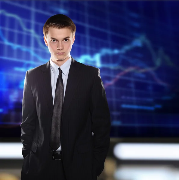 Stock Exchange Businessman in a suit against a stock quote — Stock Photo, Image