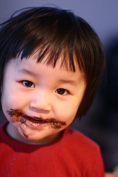 Comedor de chocolate — Fotografia de Stock