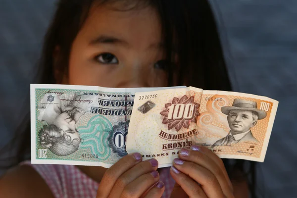 Child and money — Stock Photo, Image