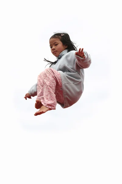 Счастливый детский прыжок — стоковое фото