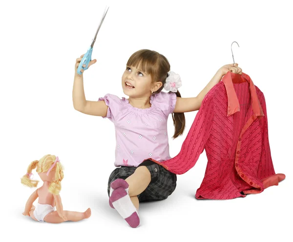 Menina está brincando com a tesoura — Fotografia de Stock