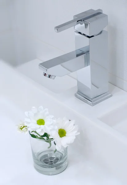 stock image Chrome tap water and flower