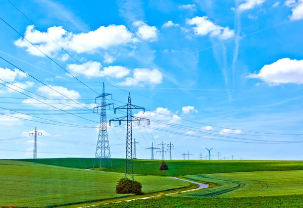 Krajina s elektrickou věž — Stock fotografie