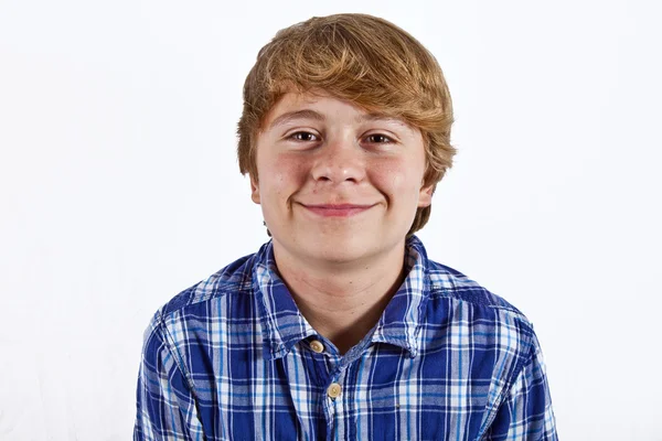 Smiling smart boy in studio Stock Image