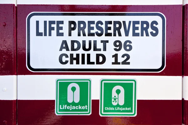 Sign for life Preservers on a ferry — Stock Photo, Image