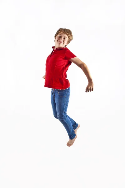 在空气中跳跃的可爱男孩 — 图库照片