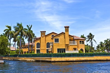 View to beautiful houses from the canal in Fort Lauderdale clipart