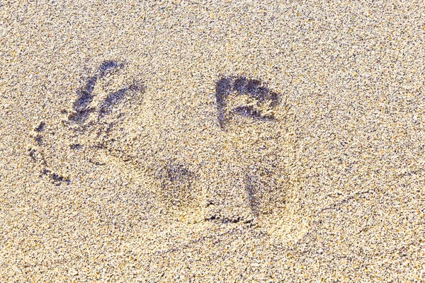 Kroky na pláži v písku — Stock fotografie