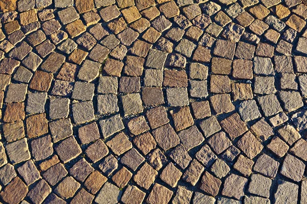 Velho padrão de pedra calçada — Fotografia de Stock