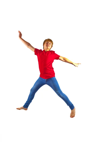 聪明的孩子与在空气中跳跃的红色衬衫 — 图库照片