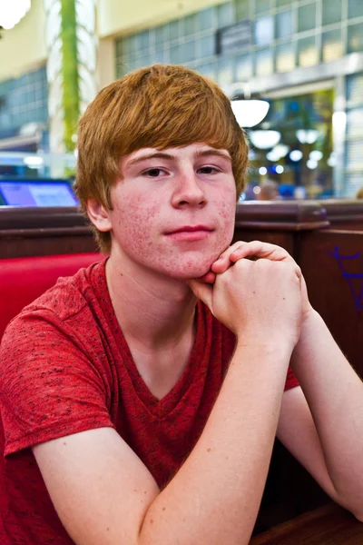Boy at night in a diners — Stock Photo, Image