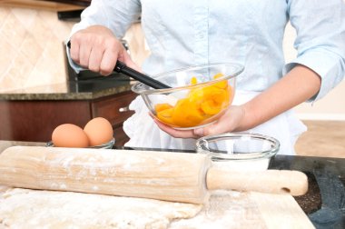 Woman mixing pie filling clipart