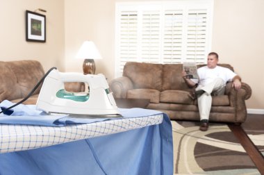 Man ironing shirt clipart