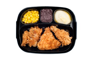 Chicken TV dinner in plastic tray clipart