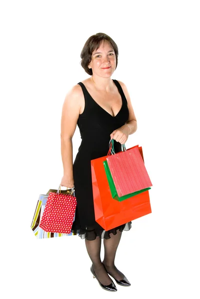 Woman carrying gift bags — Stock Photo, Image
