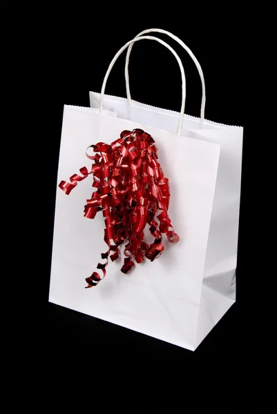 Weiße Tasche rote Schleife — Stockfoto