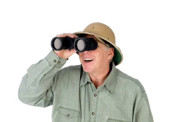 Man kijkt door een verrekijker — Stockfoto