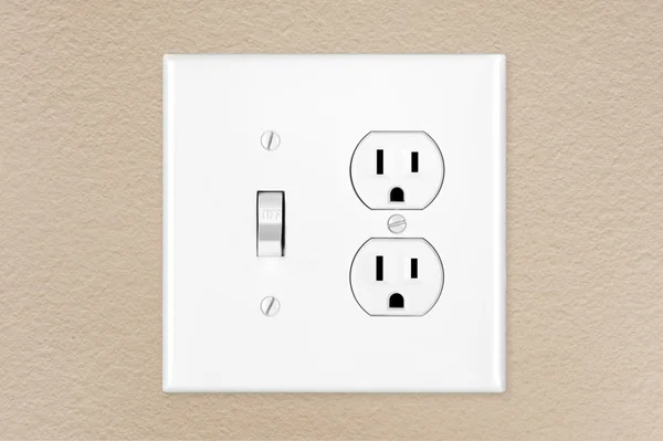Light switch on wall — Stock Photo, Image