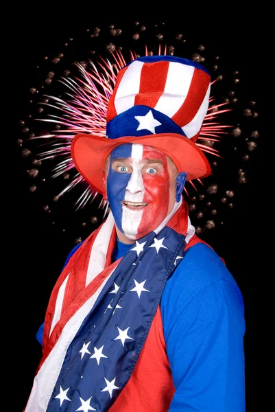 Patriotic man and fireworks — Stock Photo, Image