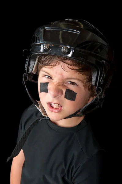 Detailní záběr mladý hokejista — Stock fotografie