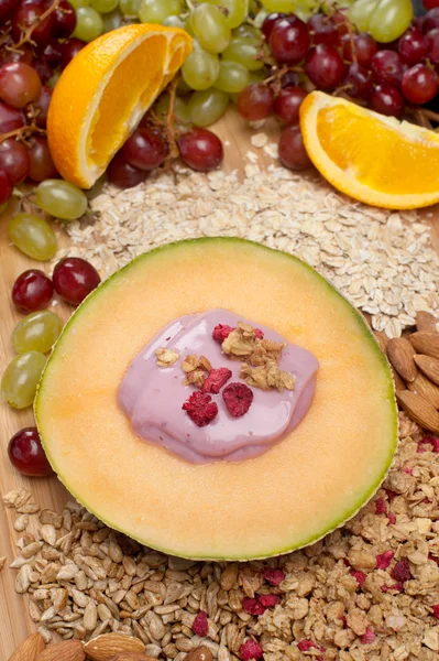 Cantaloupe and yogurt breakfast — Stock Photo, Image