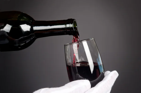 Pouring glass of wine — Stock Photo, Image