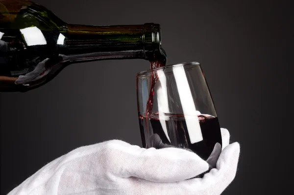 Pouring glass of wine — Stock Photo, Image