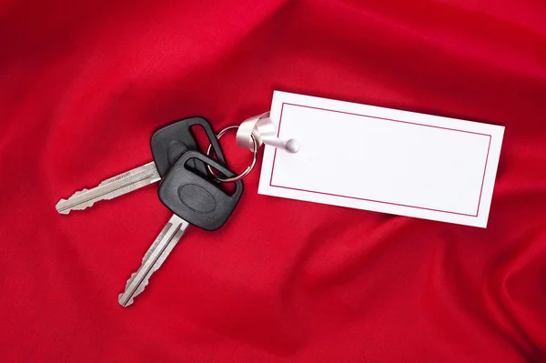 Τα κλειδιά του αυτοκινήτου στο κόκκινο — Stockfoto