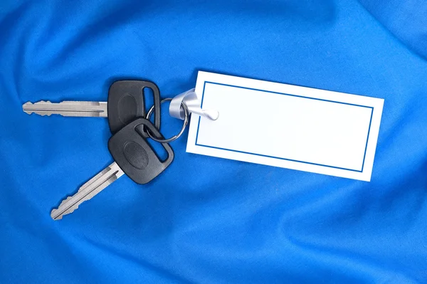 Bilnycklarna på blå — Stockfoto