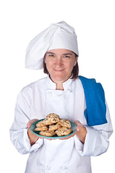 Chef segurando placa de biscoitos — Fotografia de Stock