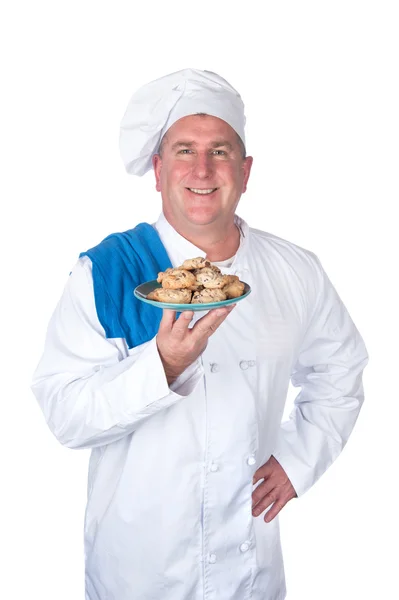 A chef holds up — Stock Photo, Image