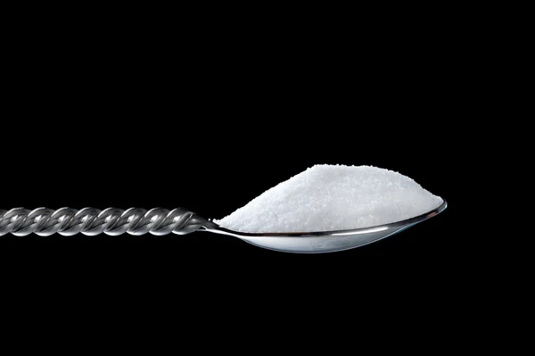 Ложка сахара — стоковое фото