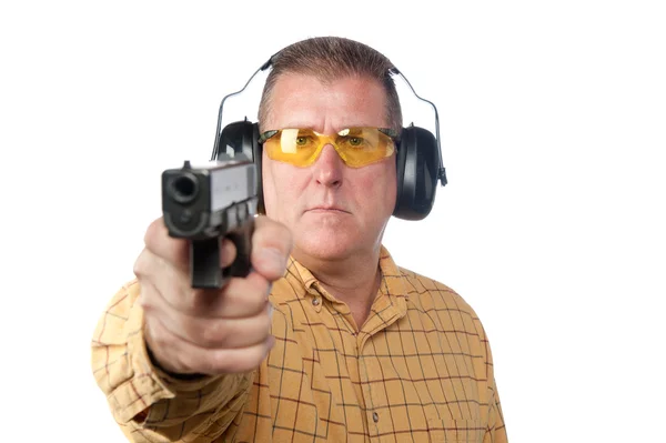 Homem disparando arma — Fotografia de Stock