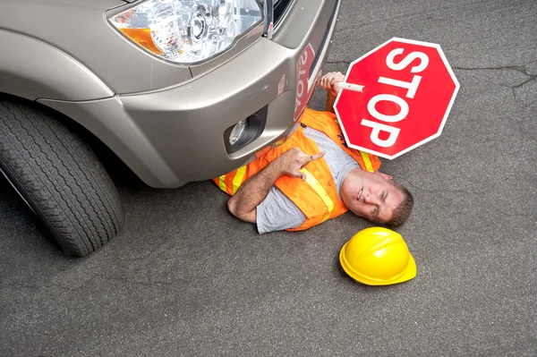 Constructure worker hit by car — Stock Photo, Image