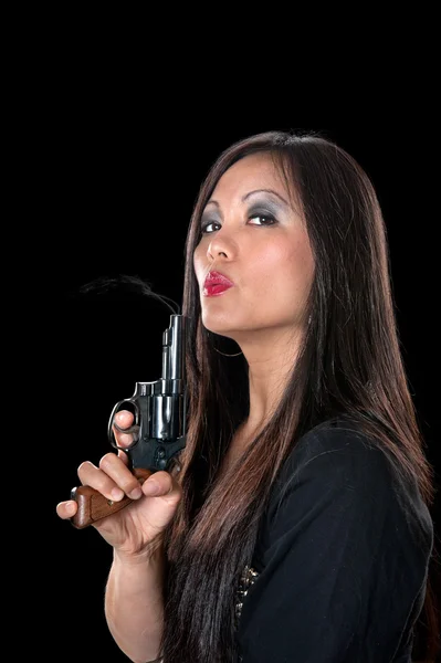 Beautiful Asian woman with gun — Stock Photo, Image