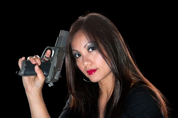 Mujer asiática con pistola —  Fotos de Stock