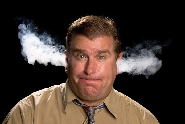 Homem louco expelindo vapor das orelhas — Fotografia de Stock