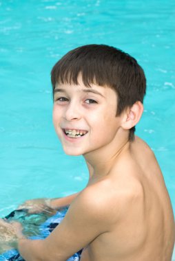 Boy at swimming pool clipart