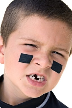 Young hockey player snarling clipart